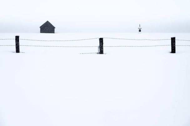 Agricultural fencing in snowy landscape - Photo, Image