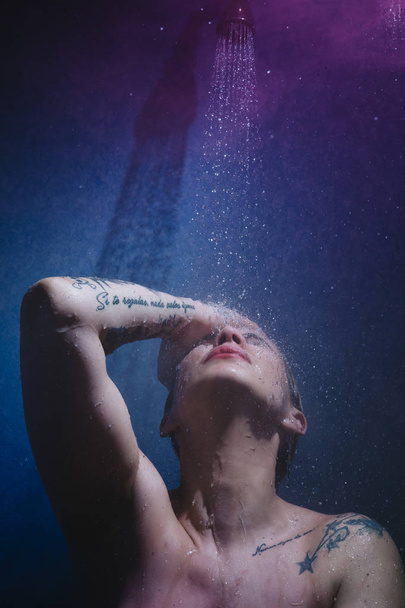 woman in shower with colorful steam - Zdjęcie, obraz