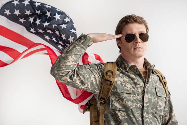 Serious usa military young man saluting - Фото, зображення