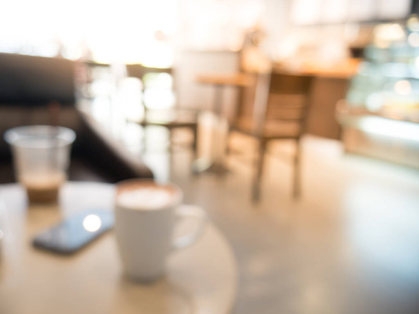 Blerred 背景には、暖かな光とコーヒー ショップ - 写真・画像