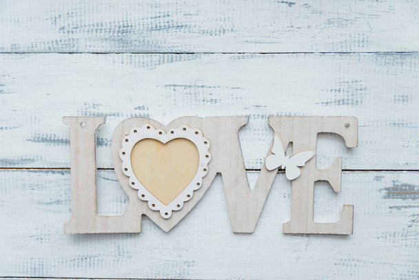white love letter on white wooden background - Foto, imagen