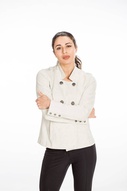 Young professional woman dressed for business with arms folded l - Photo, Image