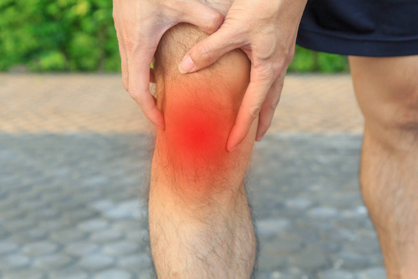 The man has pain at knee - 写真・画像