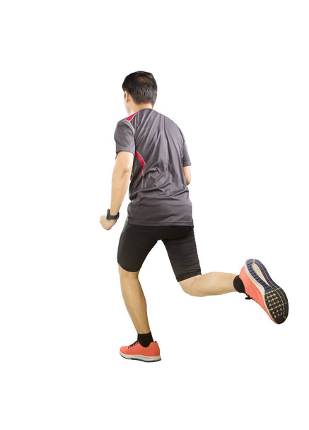 back view of sport man wearing exercise suit running forward iso - Foto, Imagen