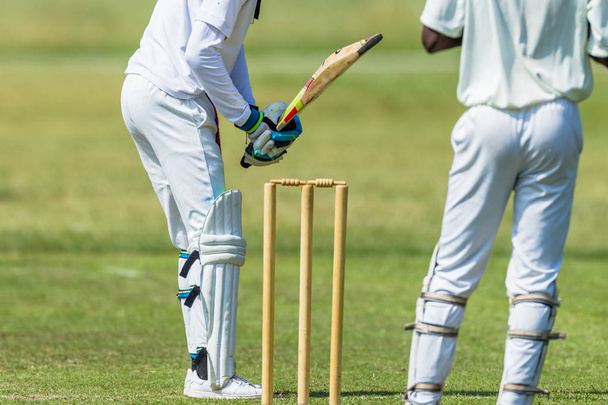 Kriketti toiminta Batsman Wickets lähikuva
  - Valokuva, kuva