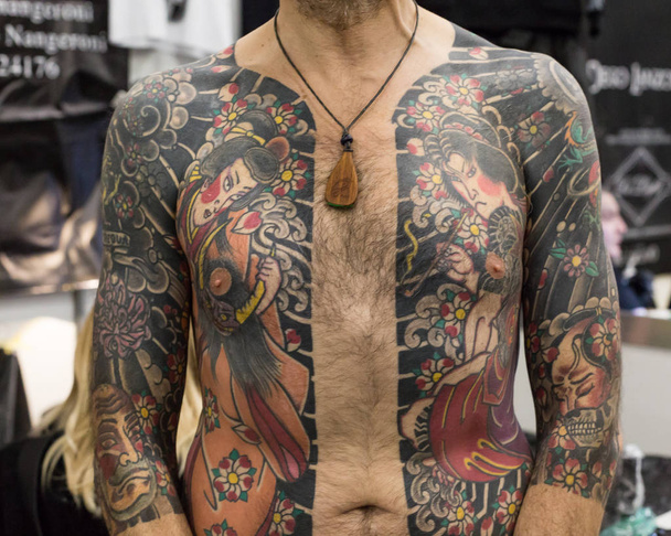 Tattoed man at Milan Tattoo Convention 2018, Italy - Foto, afbeelding