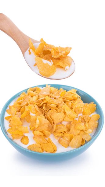Corn flakes with milk isolated on white background - Fotó, kép