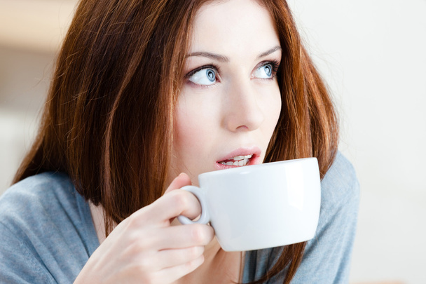 Woman drinks tea - Fotó, kép