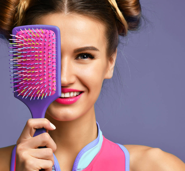 happy fashion brunette woman close eyes with colorful pink blue big hair comb brush - Photo, Image