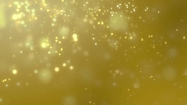 Θολή Χρυσή σκόνη πέφτει αργά κίτρινο φόντο - Πλάνα, βίντεο