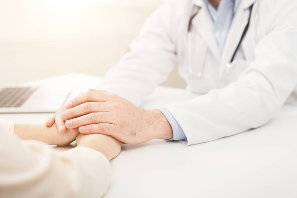 Closeup of patient and doctor hands - Φωτογραφία, εικόνα