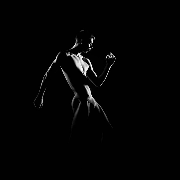 Black and white silhouette trace of male ballet dancer. - Foto, imagen