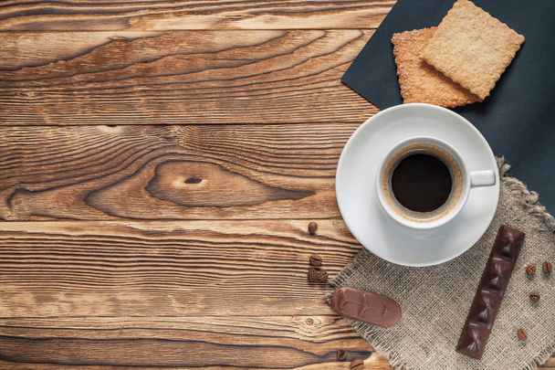 Coffee cup  on wooden table - Foto, afbeelding