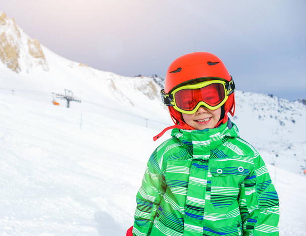 Skier boy in a winter ski resort. - Photo, Image