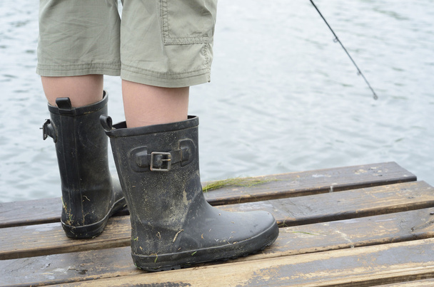 Fishing rod and boots - Foto, Bild