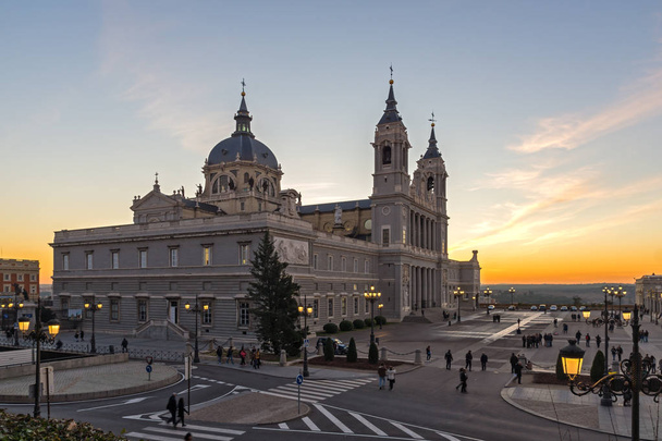 MADRID, SPAIN - JANUARY 22, 2018:  Amazing Sunset view of Almudena Cathedral in City of Madrid, Spain - Valokuva, kuva