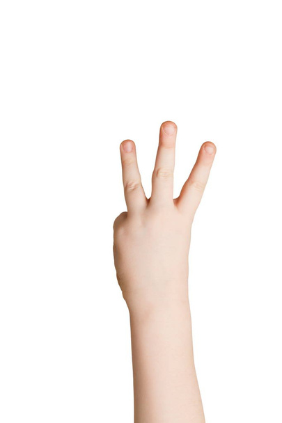 Kid ruka ukazuje číslo tři na bílém pozadí - Fotografie, Obrázek