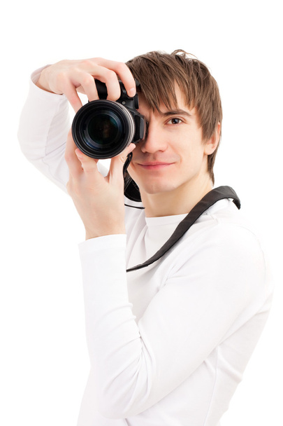 Photographer in white holding camera - Photo, Image