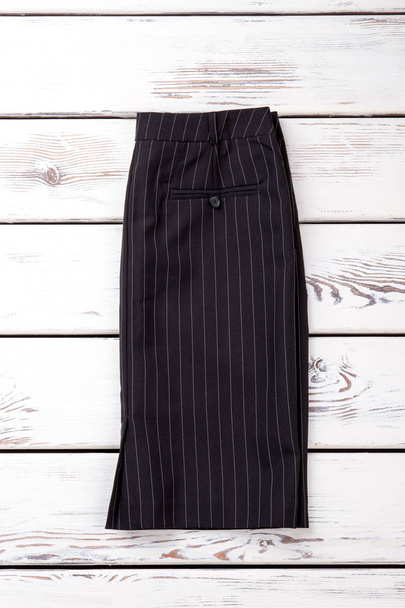 Female black skirt with white stripes. - Photo, Image