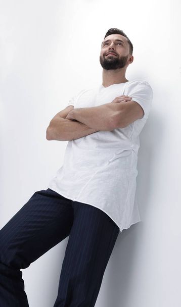 happy young man resting on a white screen - Foto, immagini