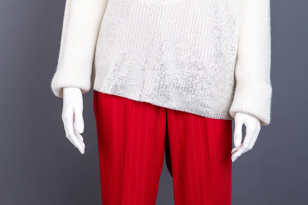 Close up female pullover and trousers. - Фото, зображення