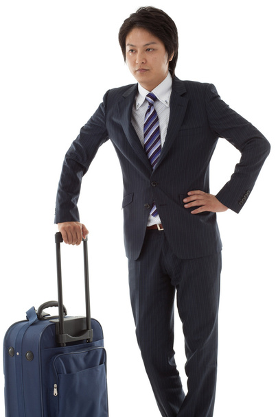 Young businessman on a business trip - Фото, изображение