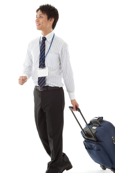 Young businessman on a business trip - 写真・画像