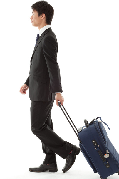 Young businessman on a business trip - Photo, image