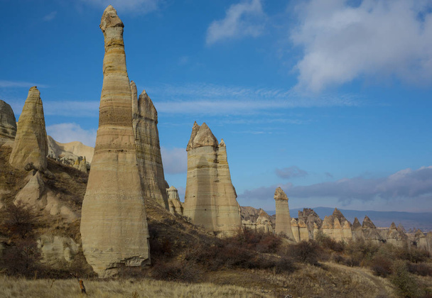 Volcanic rock formations known as Fairy Chimneys in Cappadocia, Turkey. - Foto, immagini