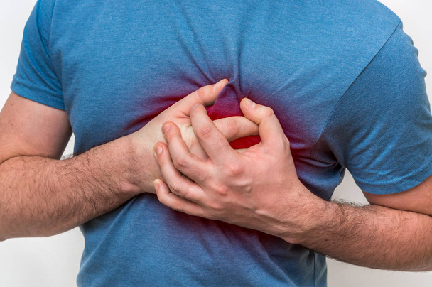 Man having chest pain, heart attack - Valokuva, kuva
