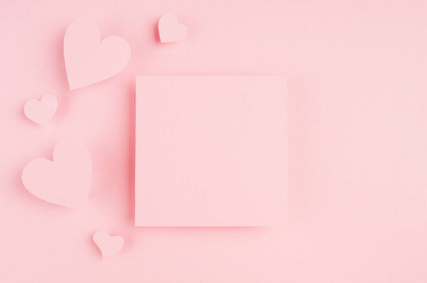 Valentines day background with blank page and paper hearts on gentle pink color background. - Foto, Bild
