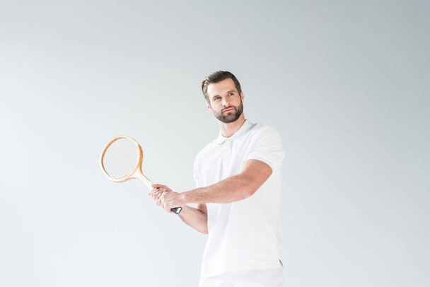 handsome tennis player with tennis racket isolated on white - Foto, immagini
