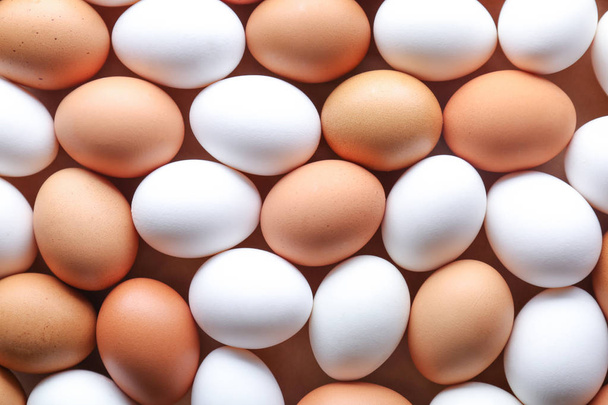 Raw chicken eggs as background - Foto, afbeelding