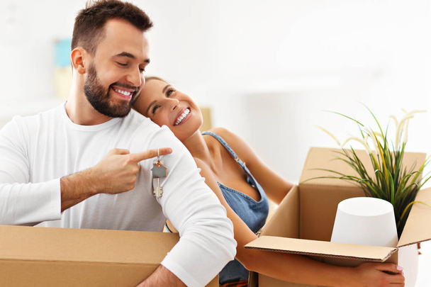 Picture showing happy adult couple moving out or in to new home - Photo, Image