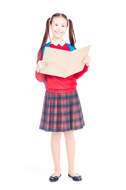 Schoolgirl with notepad - Фото, изображение