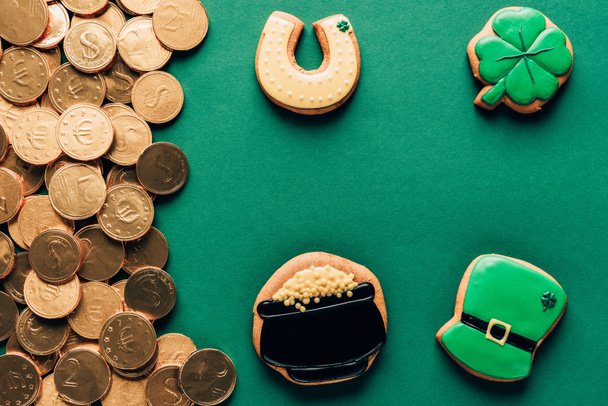 top view of icing cookies and golden coins, st patricks day concept - Photo, Image