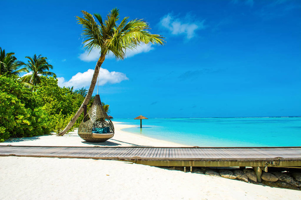 Chill lounge zone on the sandy beach, Maldives island  - Photo, Image