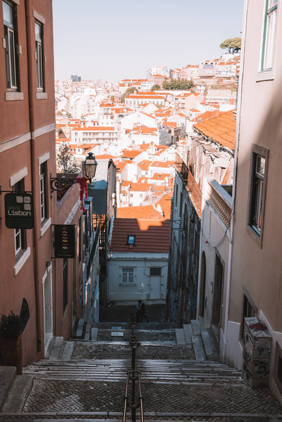 Lisbon, Portugal. August 30, 2017. Old town in Lisbon. Beautiful old narrow street in Lisbon. - Φωτογραφία, εικόνα