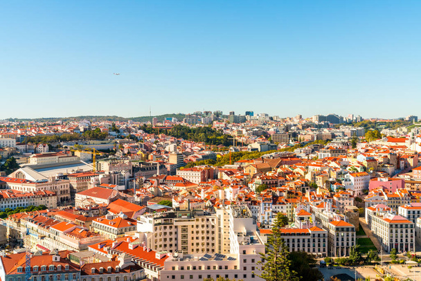 Aerial view of the Lisbon city old town from the castle on top of the hill in Portugal. - Фото, изображение