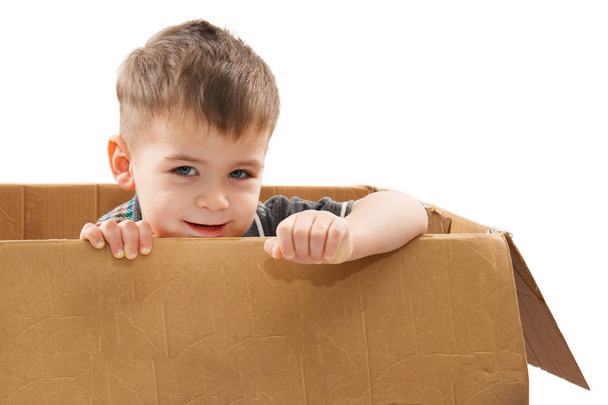 Little boy in paper box - Foto, Imagen