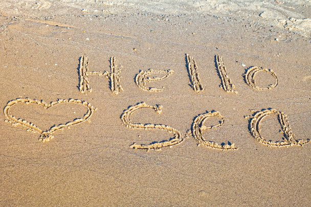 Hello Sea written in the sand. - Fotoğraf, Görsel