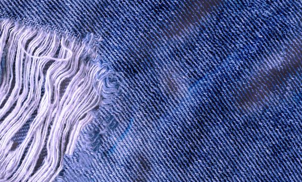 Синій джинсовий фон текстури джинсів. Джинси рвані текстури тканини
 - Фото, зображення