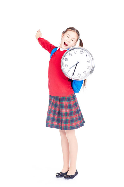 School girl holding clock - Fotoğraf, Görsel