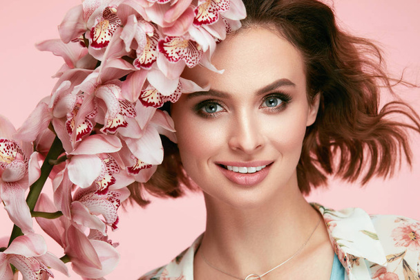 Fashion Makeup. Woman With Flowers - Photo, image