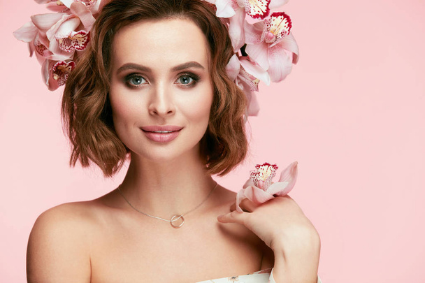 Fashion Makeup. Woman With Flowers In Hair In Spring - Фото, изображение