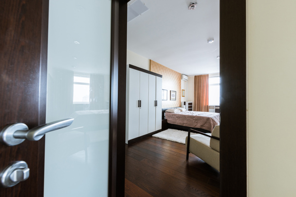 view of empty modern arranged bedroom - Photo, Image