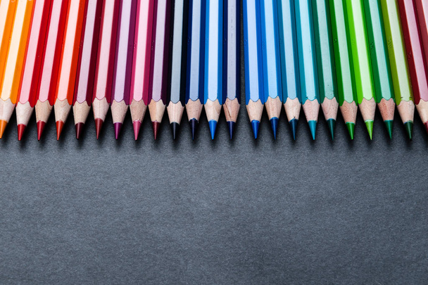 set of colored pencils on dark background - Photo, image