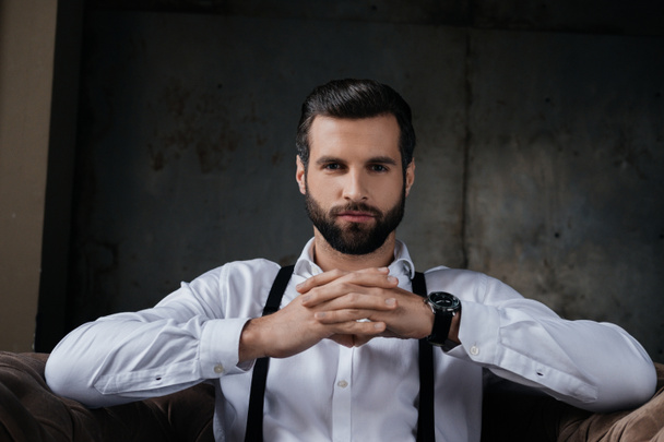 portrait of handsome confident man looking at camera - Photo, image