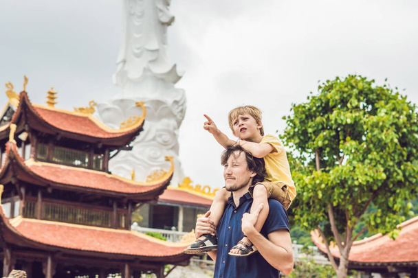 Happy tourists dad and son in Pagoda. Travel to Asia concept. Traveling with a baby concept. - Fotografie, Obrázek