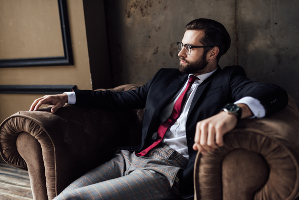 confident bearded businessman sitting in armchair  - Photo, Image